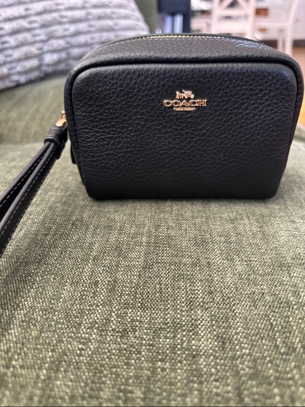 Coach Black Pebbled Leather Wristlet Pouch with Gold Logo

Used once. Like new